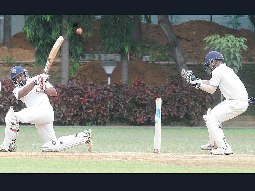 President's XI Abhishek Reddy plays a shot on his brillient 201 runs against Bangalore Zone on the 2nd days play of the Shafi Dharashah Cricket Tournament at RSI grounds in Bengaluru. DH Photo