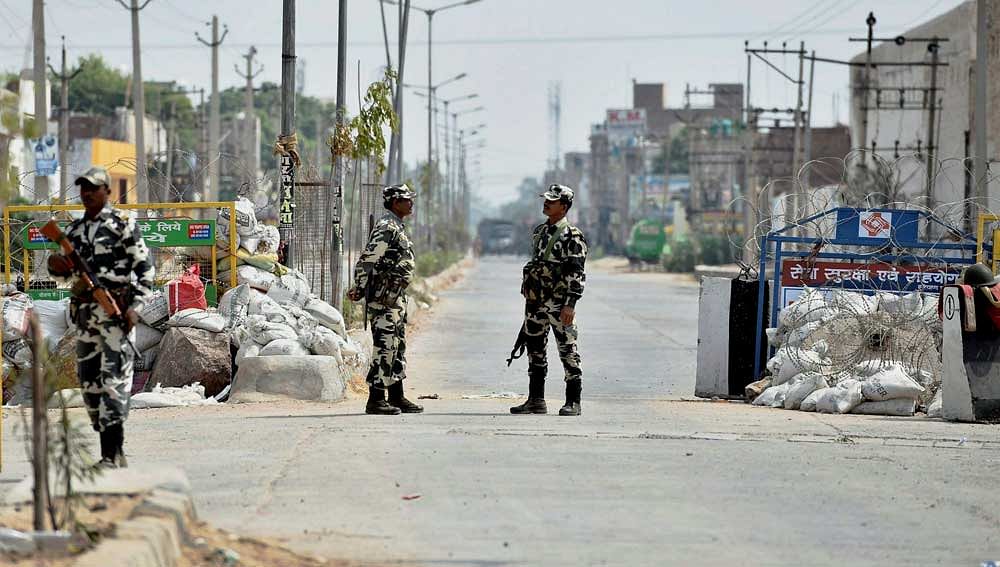 Police personnel have been deployed all around the Sunaria jail to ensure nothing untoward occurs. PTI photo.
