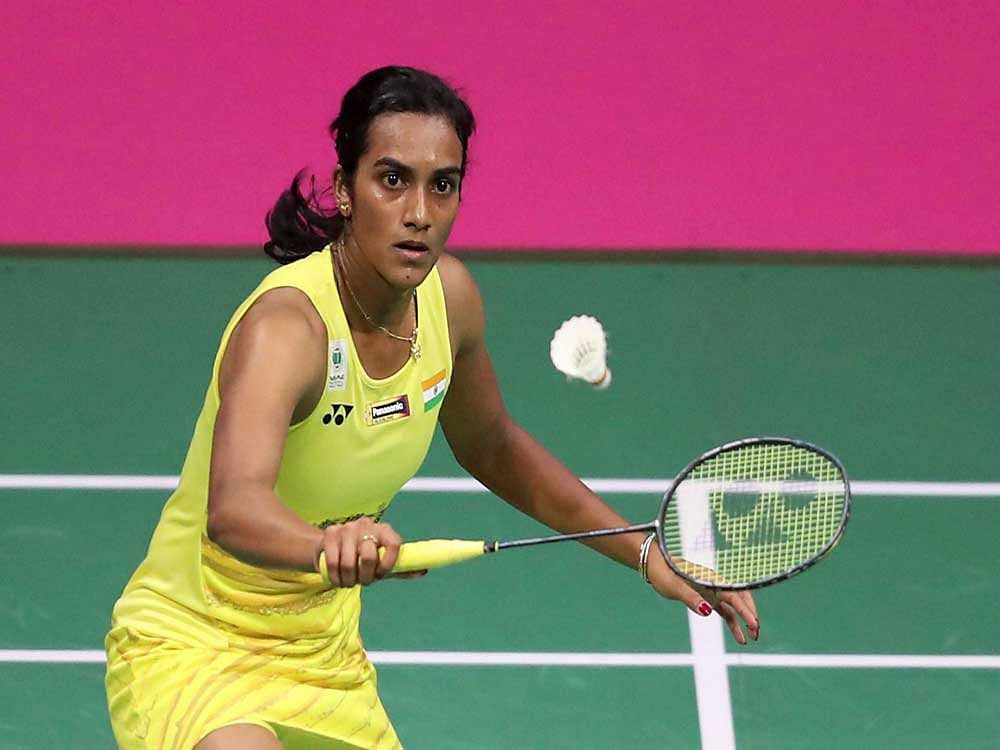 In a nerve-wracking final, which tested the physical and mental strength of both the players, Sindhu lost 19-21 22-20 20-22 after battling hard for one hour and 49 minutes. AP/PTI photo