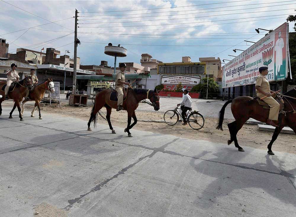 Security personnel patrol after the curfew was relaxed for 12 hours in Sirsa on Tuesday. PTI Photo