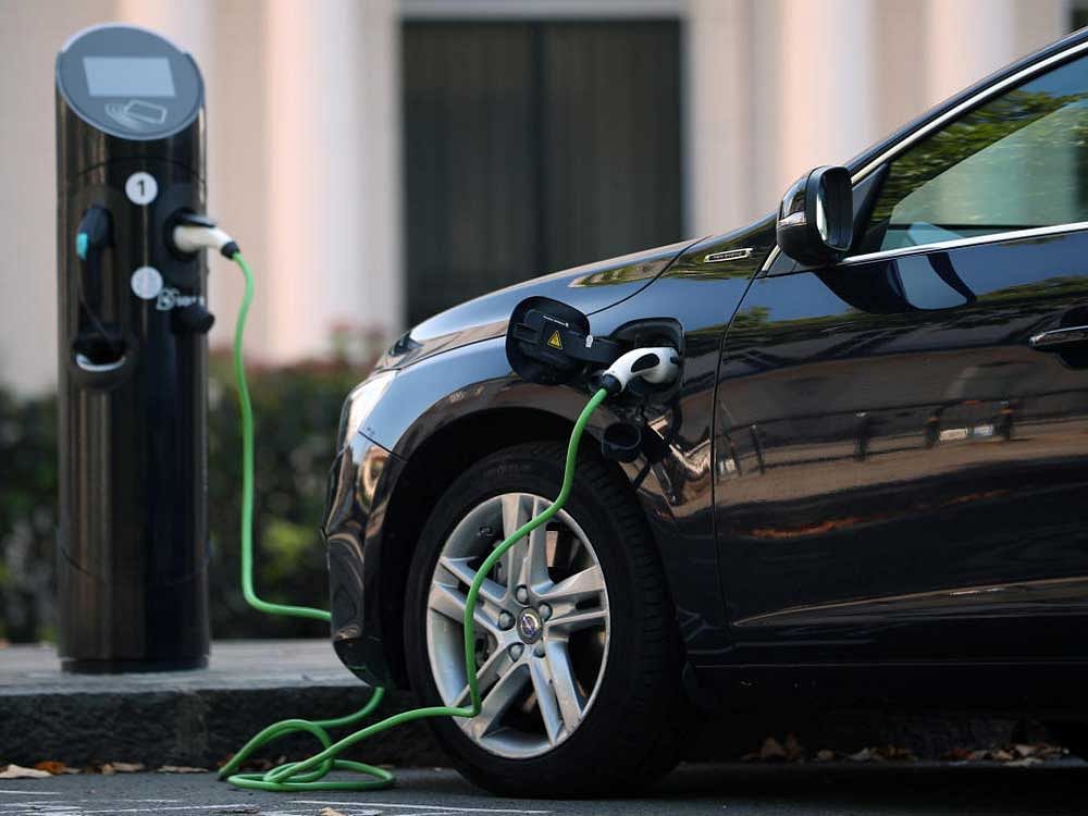 A Volvo hybrid car is seen connected to a charging point in London, Britain September. Reuters Image