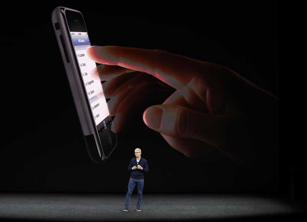 Tim Cook, CEO of Apple, introduces the iPhone 8 during a launch event in Cupertino, California, U.S. September 12, 2017. REUTERS