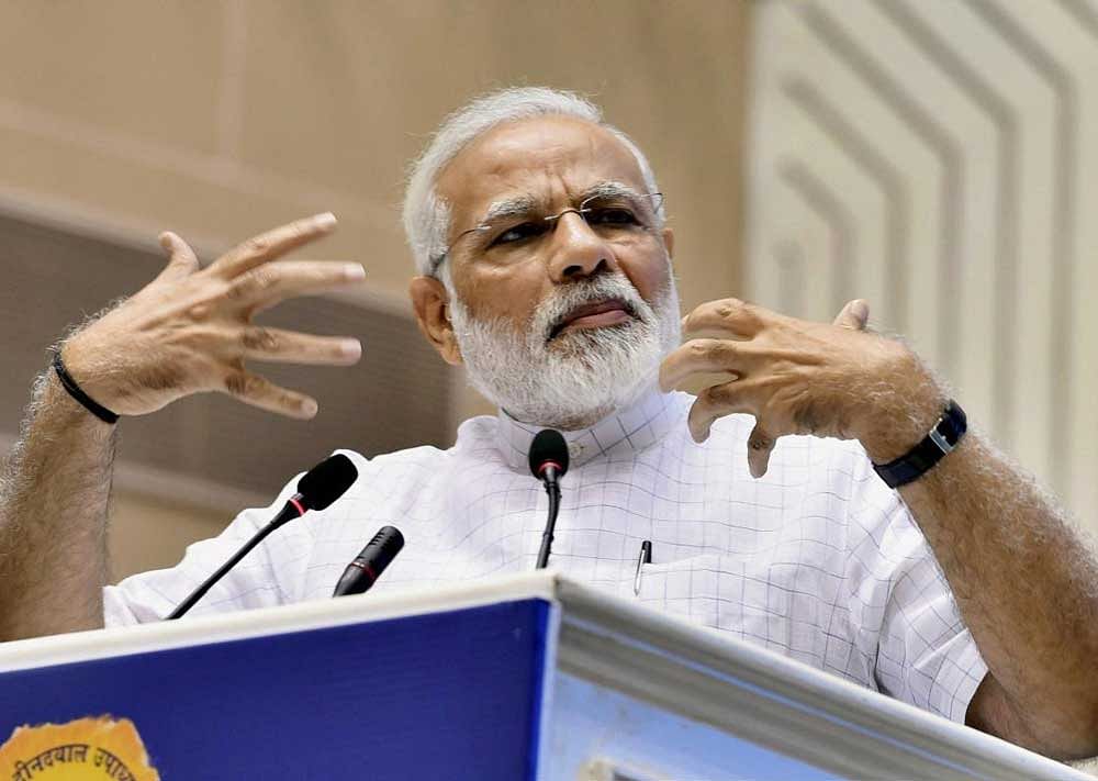 Answering his critics, Prime Minister Narendra Modi today said he uses his monthly radio programme 'Mann Ki Baat' to reflect the views and aspirations of the people of the country rather than expressing his own opinions. PTI file photo
