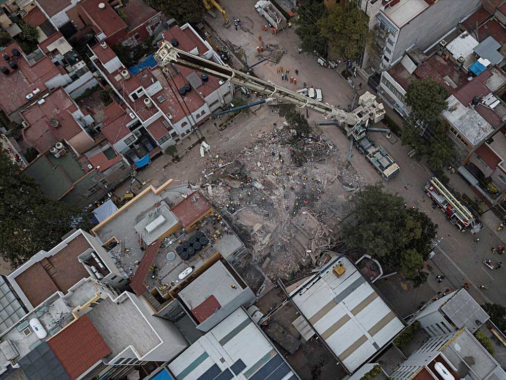 An areal the view of remains of a building in Escocia and Gabriel Mancera street in the Del Valle neighborhood of Mexico City, on Saturday, Sept. 23, 2017. A strong new earthquake shook Mexico on Saturday morning, causing street signs around the collapsed building to sway and rescue workers to evacuate the site temporarily. AP/PTI Photo.  Representational Image.