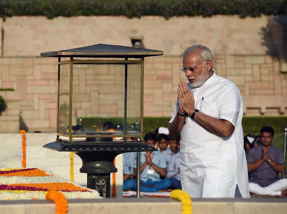 He paid tributes to the two leaders at Raj Ghat and Vijay Ghat, their respective memorials. Credit: Twitter/Narendra Modi