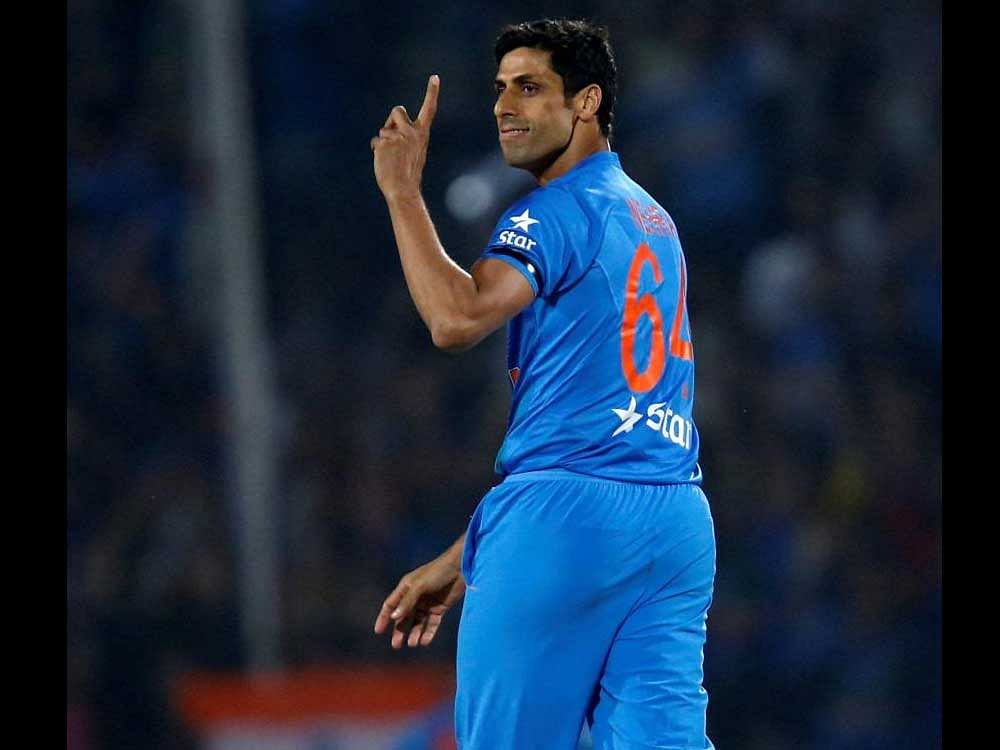 Ashish Nehra and Dinesh Karthik have made a dramatic comeback to Indian side. Reuters Photo