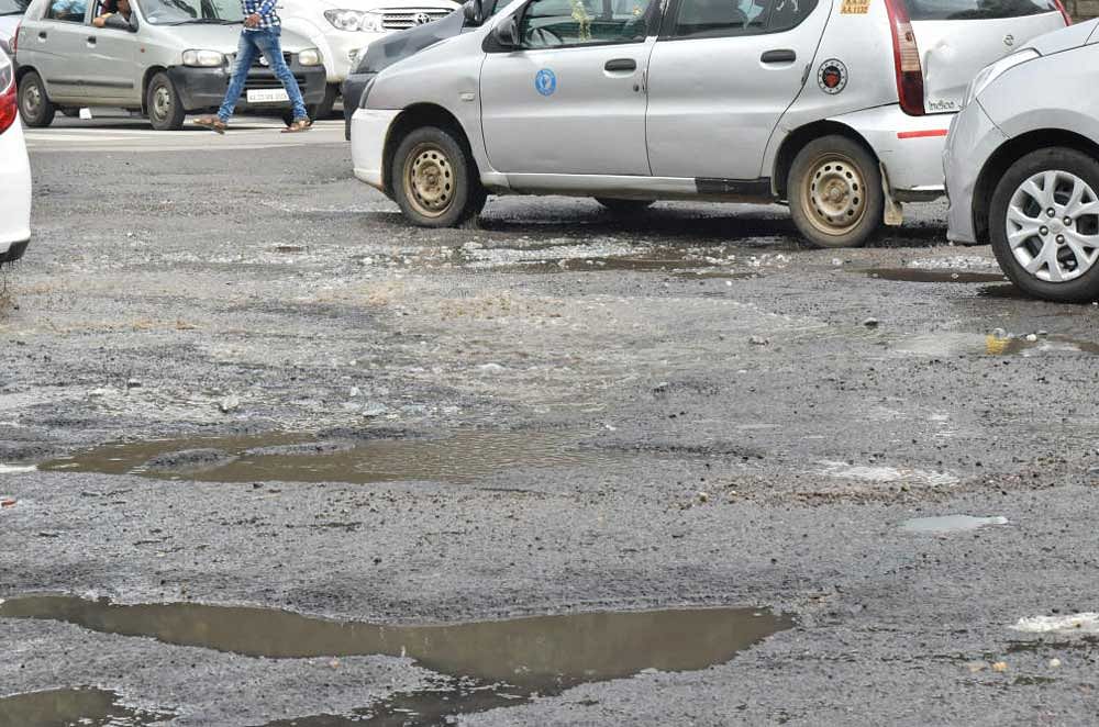 BJP state spokesperson and Rajajinagar MLA S Suresh Kumar on Wednesday wondered why 'murder charges' should not be framed against the Bruhat Bengaluru Mahanagara Palike (BBMP) as the 'killer potholes' in the city have claimed human lives by the day. File photo
