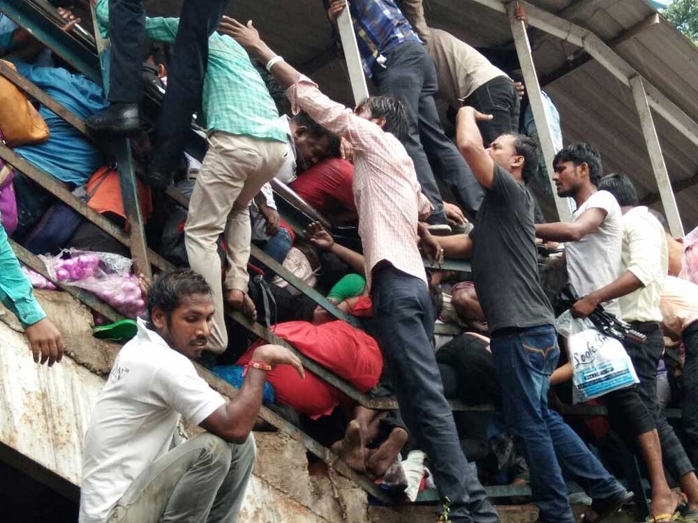 As the railways investigates the Elphinstone Road station stampede, a student survivor has told the inquiry panel that a flower vendor's cry of phoolgirgaya (flowers have fallen) being mistaken as pul girgaya (the bridge has fallen) might have set off the panic. PTI file photo