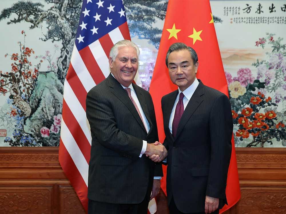 U.S. Secretary of State Rex Tillerson (L) with Chinese Foreign Minister Wang Yi (R). Reuters Photo