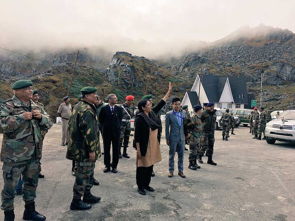 The Chinese issued the statement in response to Nirmala Sitharaman visiting the Nathu La outpost. In photo: Nirmala Sitharaman acknowedges Chinese troops as they take photographs of her at the Nathu La outpost.