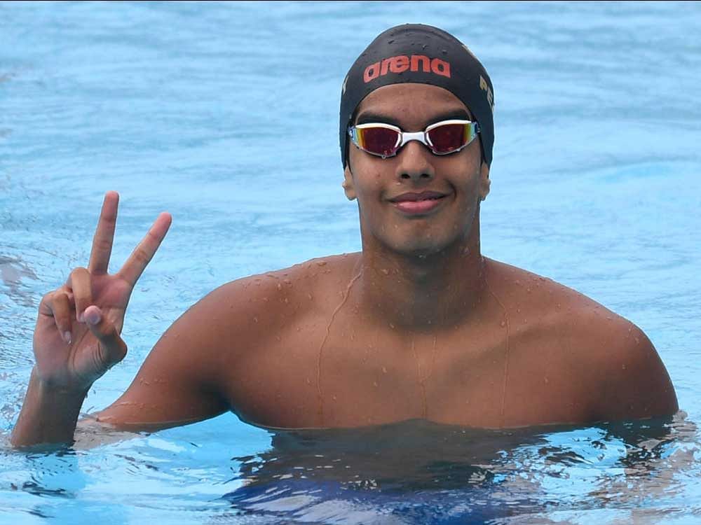 Leading their charge was the 16-year-old backstroker Srihari Natraj who dished out a fine performance to win the 50M backstroke in record time. DH Photo.