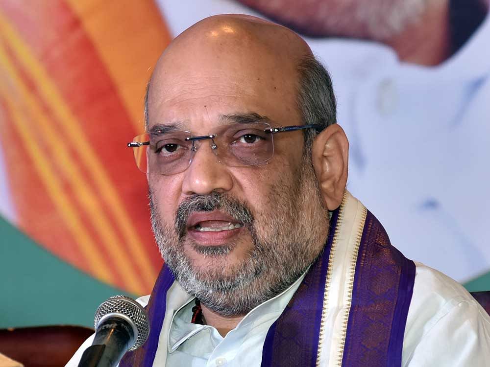Amit Shah accused Kerala CM Vijayan of being instrumental in the political killings of opposition workers. DH file photo.