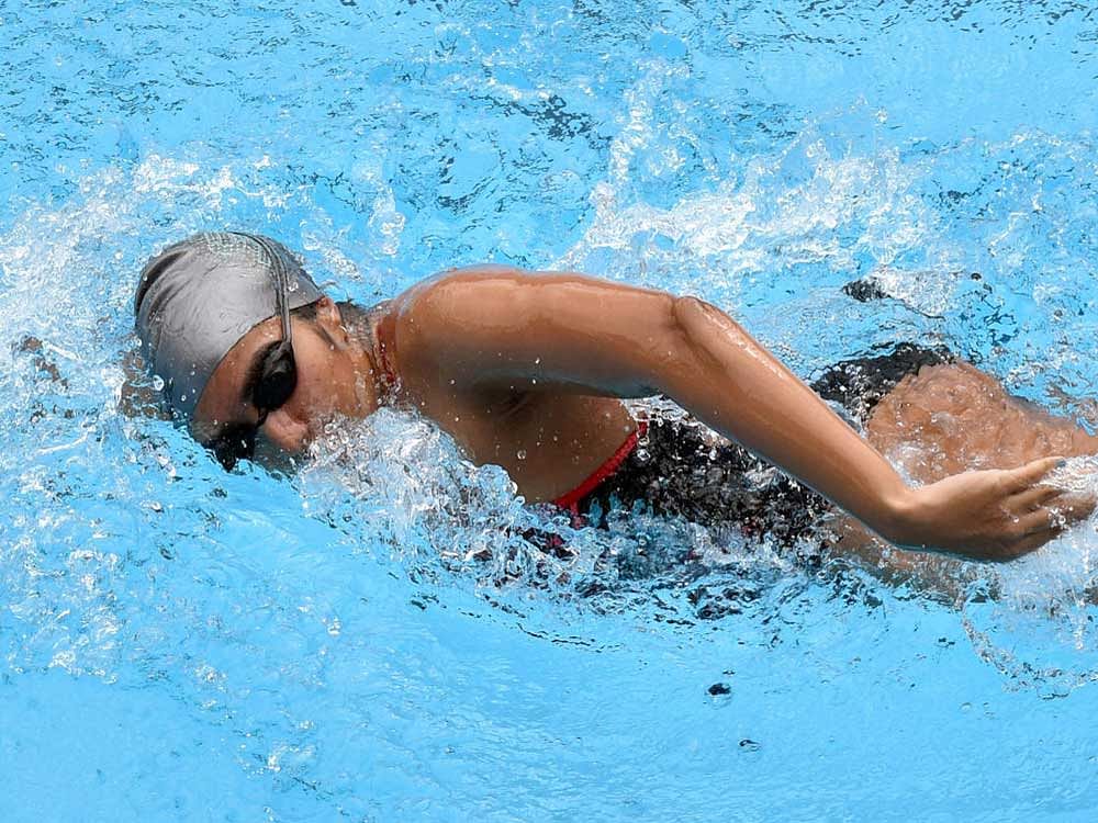 Malavika V clinched the 1500M freestyle gold to swell Karnataka's medal count . DH file photo