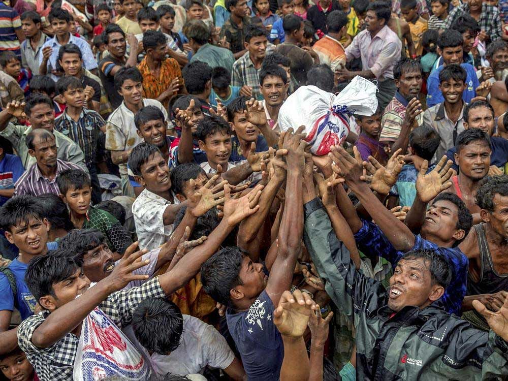 Nearly 520,000 Rohingya Muslims have arrived in Bangladesh since late August, fleeing a military crackdown in neighbouring Myanmar that the UN has said likely amounts of ethnic cleansing. Photo credit: AP PTI.