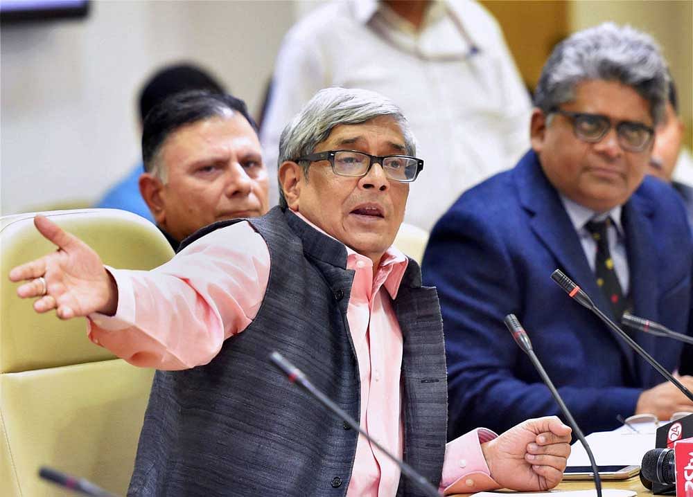Bibek Debroy, Chairman, Economic Advisory Council to the Prime Minister (EAC-PM) with members Ratan P Watal and Rathin Roy during a press conference in New Delhi on Wednesday. PTI Photo