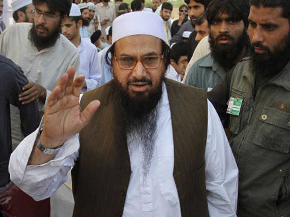 The Punjab Home Department issued an order extending the house arrest of Jamat-d-Dawah chief Hafiz Saeed and four other JuD men for another 30 days with effect from September 25 under the public order. The previous detention order issued on July 28 was expired on September 25. Reuters file photo.