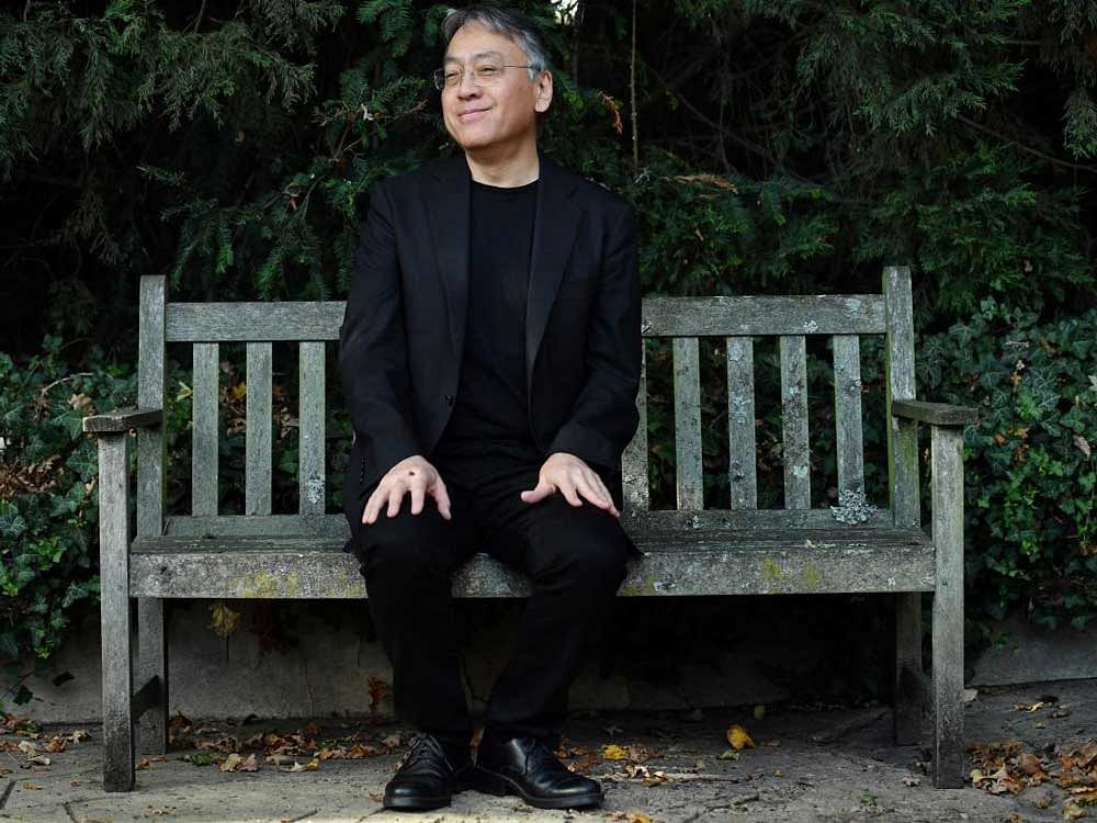 TOPSHOT - British author Kazuo Ishiguro holds a press conference in London on October 5, 2017 after being awarded the Nobel Prize for Literature. Kazuo Ishiguro, the 62-year-old British writer of Japanese told British media that winning the 2017 Nobel Prize for Literature today was a "magnificent honour" and "flabbergastingly flattering". / AFP PHOTO / Ben STANSALL