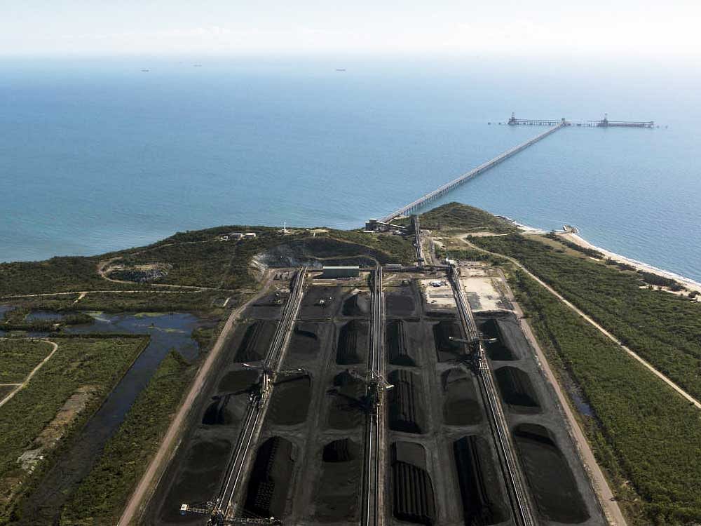 The coal terminal at Abbot Point, near the Great Barrier Reef in northeastern Australia. The port would require expansion as part of the Adani Group's plans to build one of the world's largest coal mines inland of here. nyt