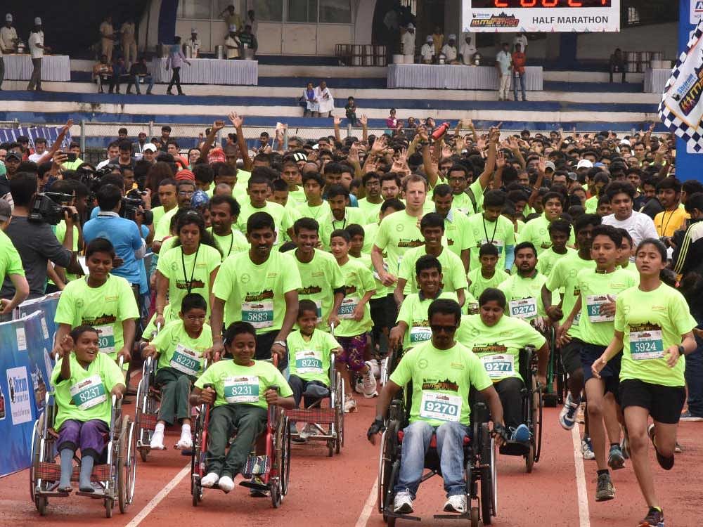 Differently abiled children participated in the Bengaluru Marathon 5K Run at Kanteerava Stadium on Sunday. DH Photo