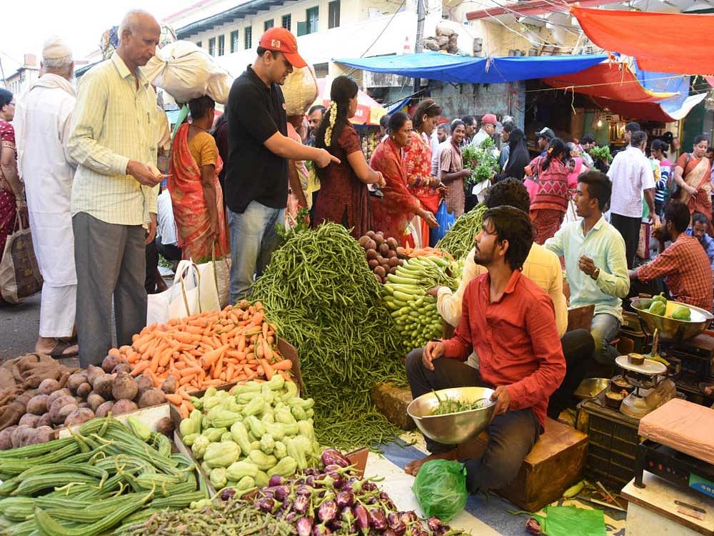 Falling prices in vegetables has helped bring down wholesale inflation in September, but it still remains much higher than its value the same time last year. DH file photo for representation.