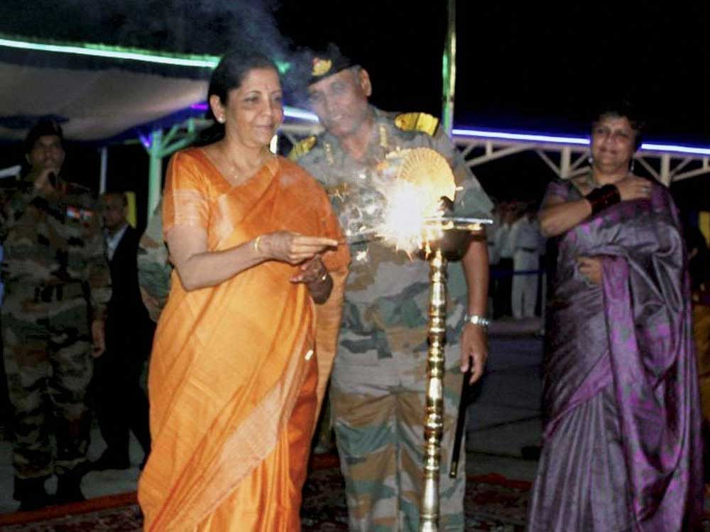 Defence Minister Nirmala Sitharaman celebrating the Diwali with troops and their families, at the Andaman and Nicobar Command, on Wednesday. PTI