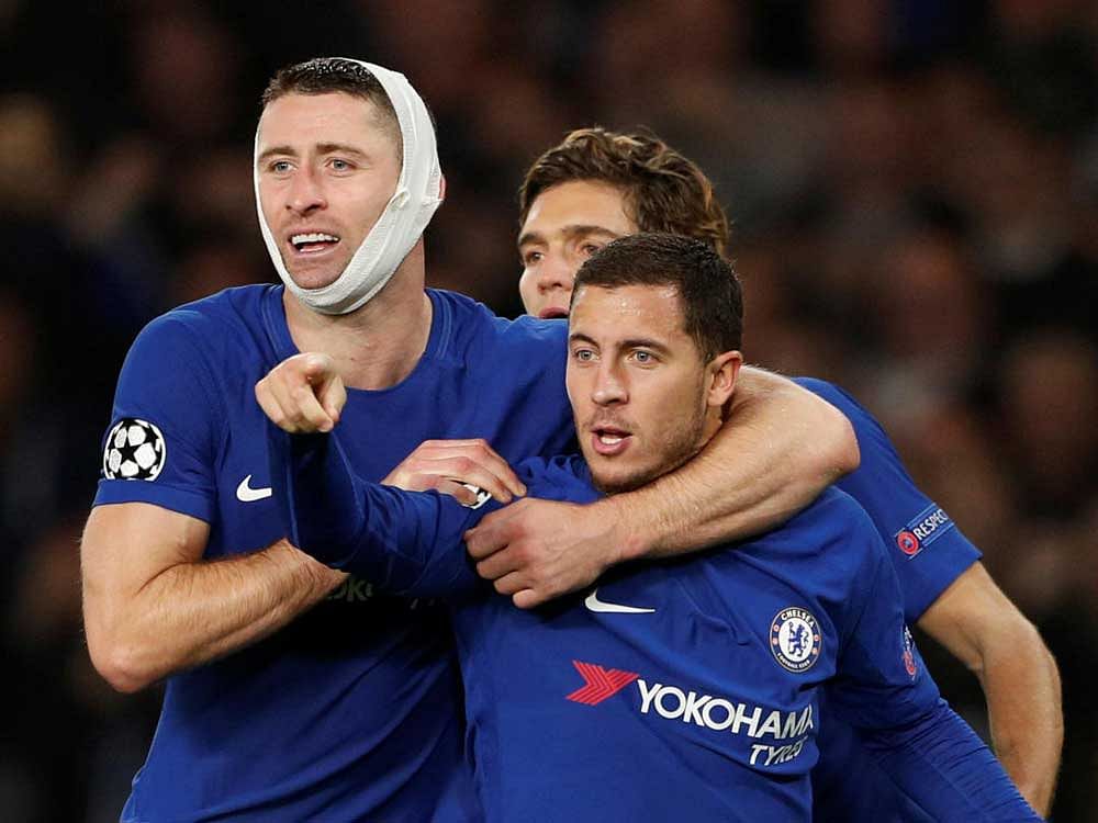 DRAMATIC END: Chelsea's Eden Hazard (right) celebrates after scoring the equaliser against Roma during their Champions League encounter on Wednesday. Reuters