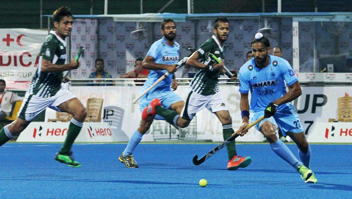 Players of India and Pakistan in action during their match at the 10th men's Asia Cup hockey tournament, in Dhaka on Sunday. PTI Photo