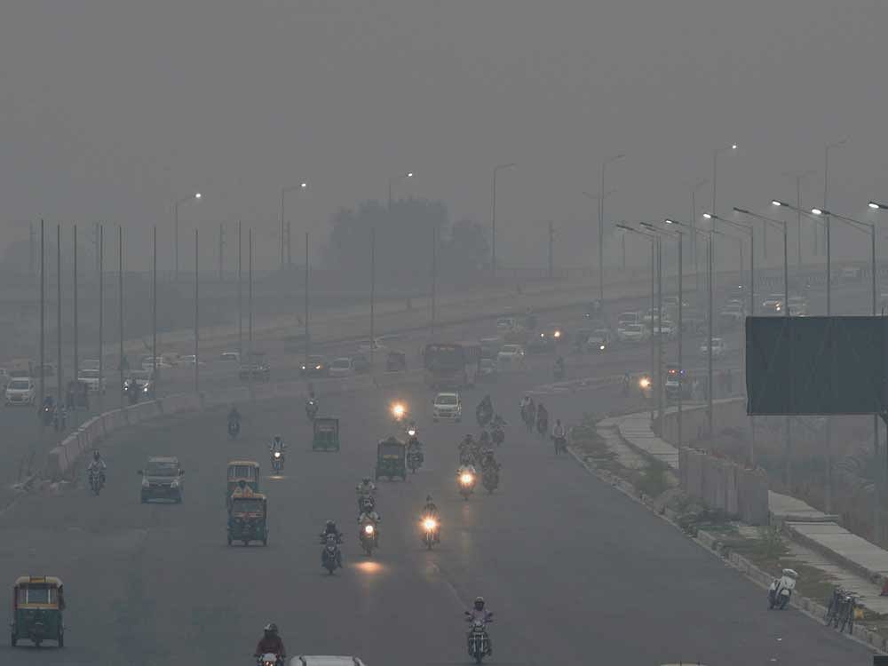 Smog covers the city, a day after Diwali festival in New Delhi on Friday. PTI Photo