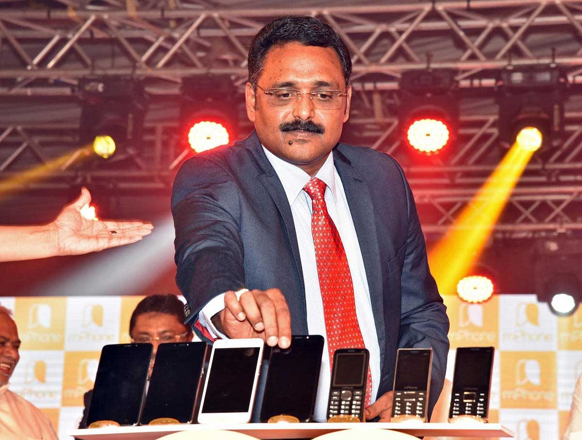 Roji Augustine, Chairman, mPhone launches mPhone 7s series in Bengaluru on Saturday. DH photo