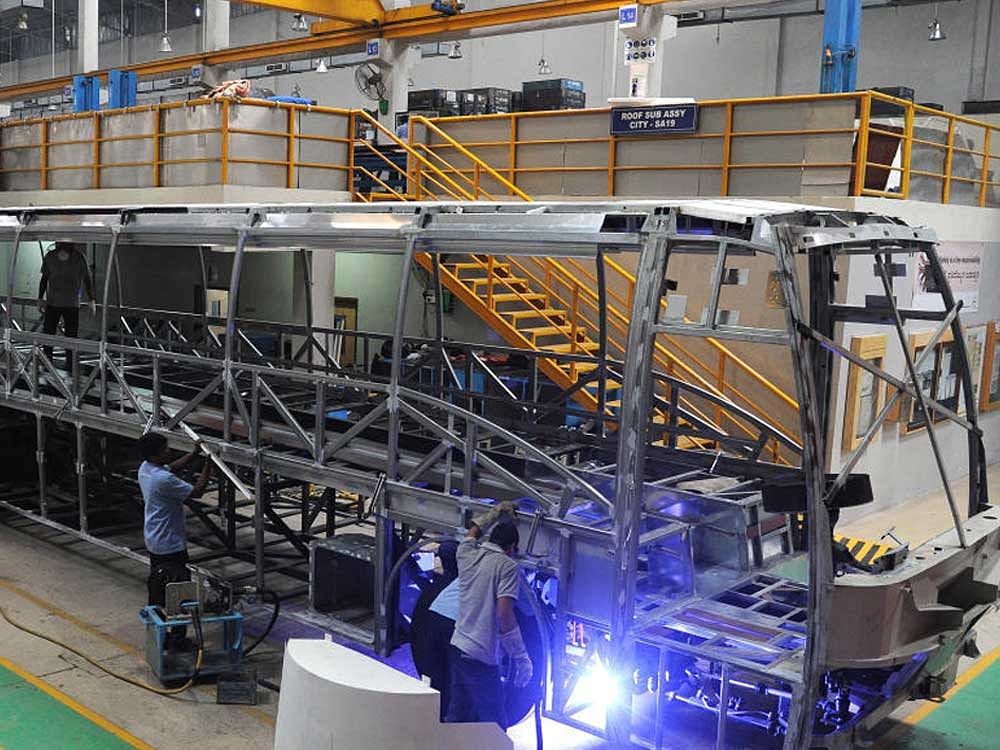 Staff at the Volvo Buses plant near Bengaluru work on a multi-axle chassis, which will eventually evolve as one of the safest and efficient buses to ply the Indian roads. DH Photos by Srikanta Sharma R