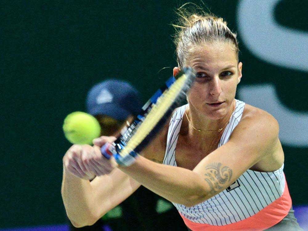 Karolina Pliskova returns during her match against Venus Williams in Singapore on Sunday. AFP