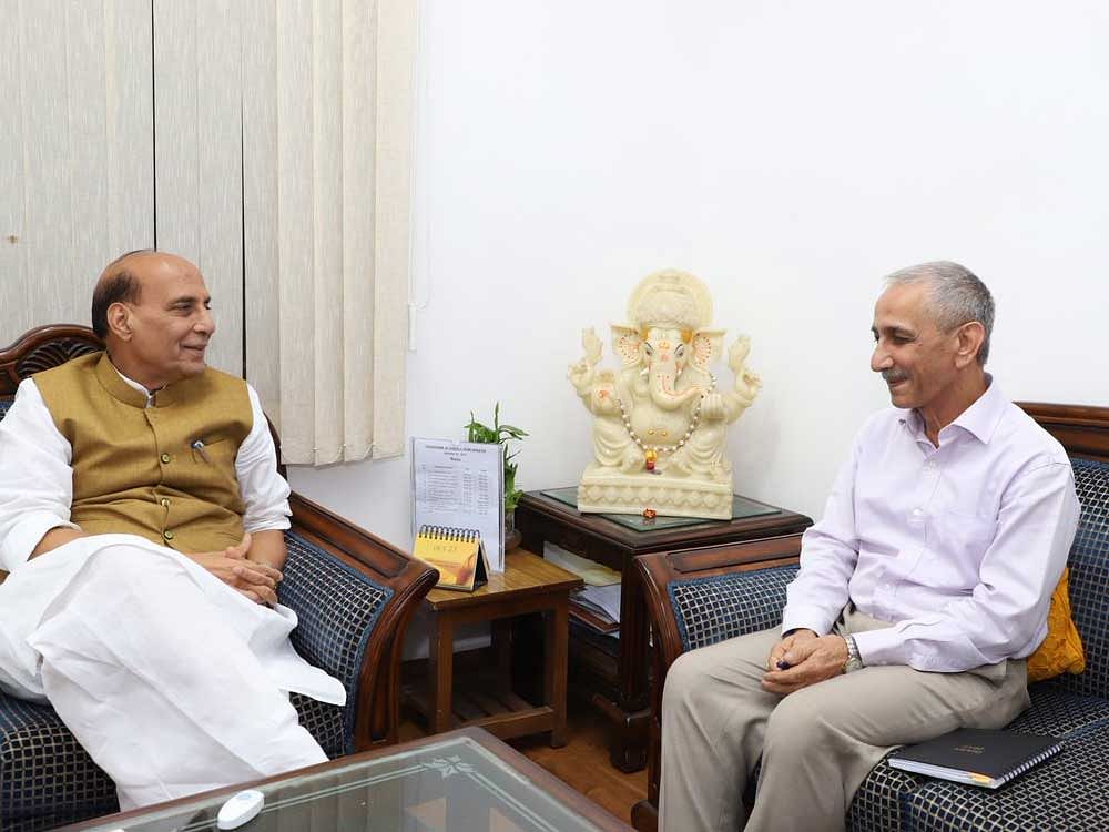 Home Minister Rajnath Singh and Former IB chief Dineshwar Sharma. ANI