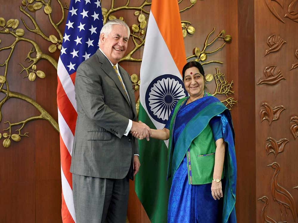 U.S. Secretary of State Rex Tillerson poses with Minister for External Affairs Sushma Swaraj before a meeting in New Delhi on Wednesday. PTI Photo