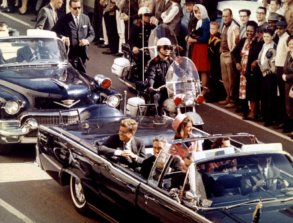 U.S. President John F. Kennedy, First Lady Jaqueline Kennedy and Texas Governor John Connally ride in a liousine moments before Kennedy was assassinated, in Dallas, Texas November 22, 1963. Walt Cisco/Dallas Morning News/Handout/File Photo via REUTERS.
