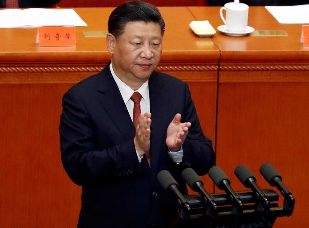 Xi, 64, began his second tenure on Thursday by holding a meeting of top military officials, regarded as a main source of power base. Photo credit: Reuters.