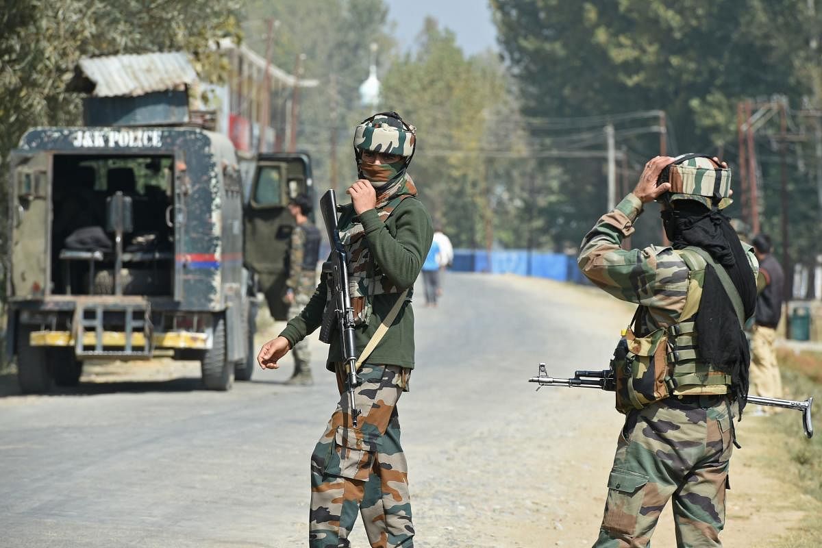 Security forces cordoned off the Mir Mohalla village in Hajin area of Sringar following intelligence inputs about the presence of militants there. PTI File Photo