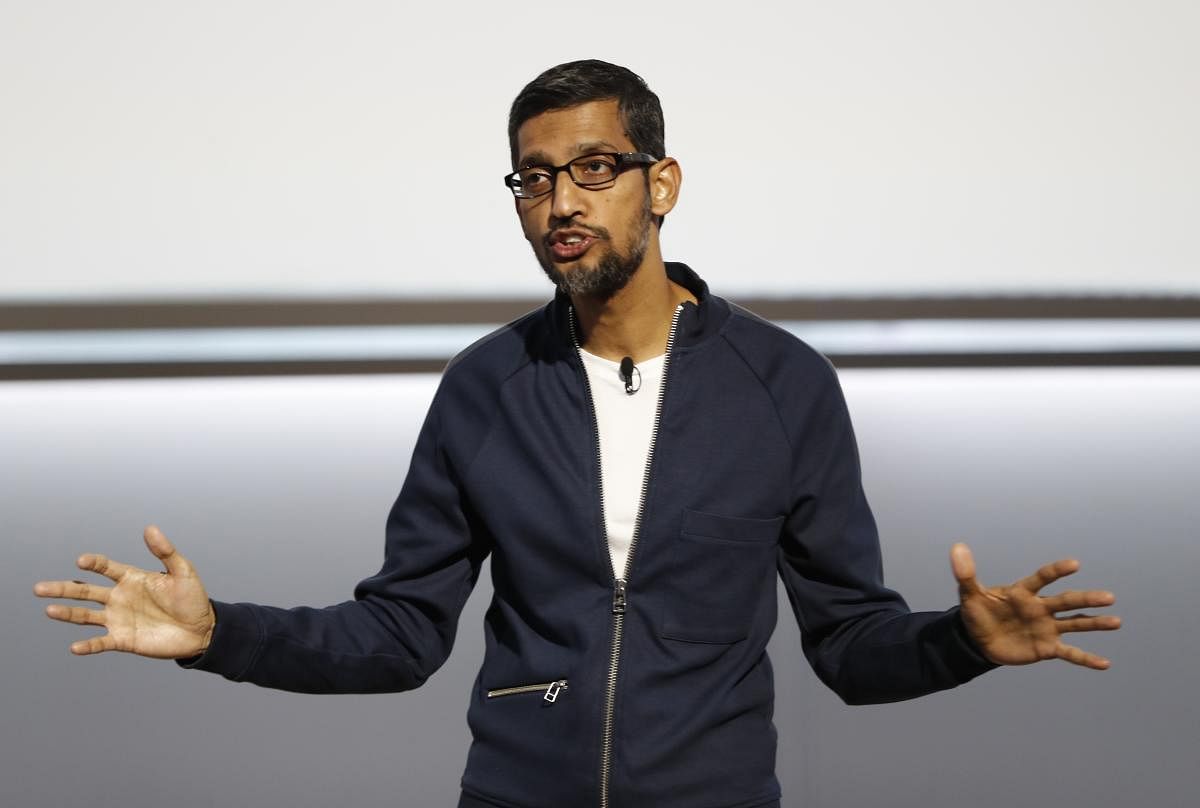 Pichai has chosen to 'drop everything else' and address the aggravating difference of cheese placement in the burger emoji used by Google and Apple. Reuters photo/Stephen Lam.