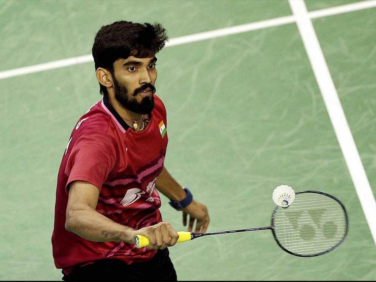 India's Srikanth Kidambi plays a shot against Japan's Kenta Nishimoto during their men's final match of the French Open badminton tournament in Paris, Sunday, Oct. 29, 2017.
