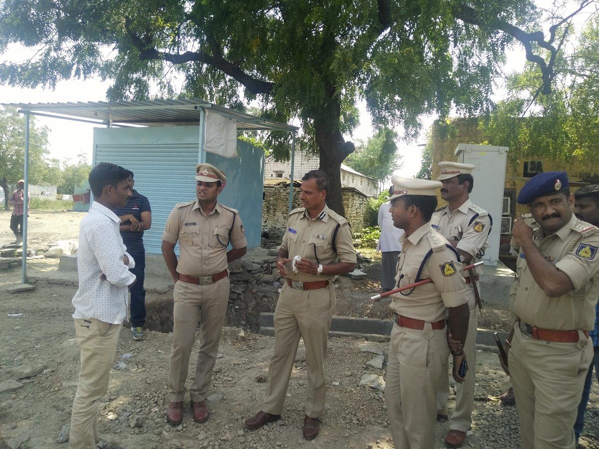 IGP Alok Kumar along with SP N Shashi Kumar and others reviews security at Andola village in Jewargi taluk on Tuesday.