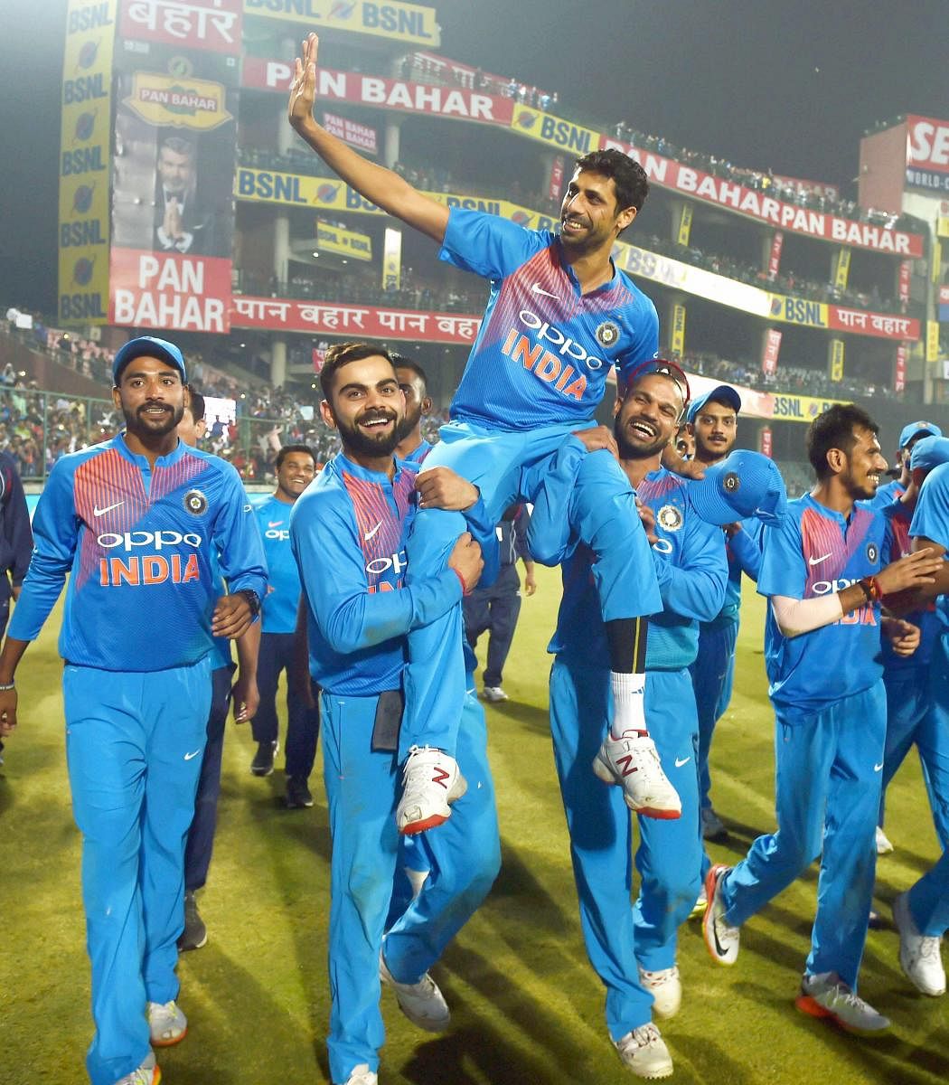 India's Ashish Nehra waves to the crowd after his retirement from all forms of cricket during the first T20 match against New Zealand at Feroz Shah Kotla Stadium in New Delhi, on Wednesday. PTI Photo