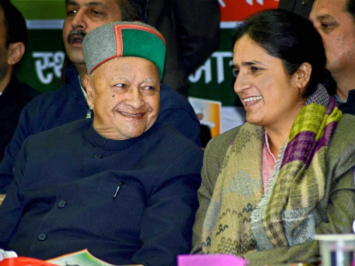Himachal Pradesh Chief Minister Virbhadra Singh and Congress party's state co-incharge Ranjeet Ranjan during the launch of party's vision document for the assembly elections, in Shimla on Wednesday.