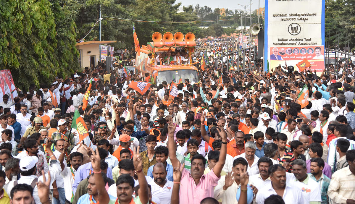 Crowd at the BJP Parivarthana Yatra at Bangalore International Exhibition Centre (BIEC) in Bengaluru on Thursday. Photo by Janardhan B K