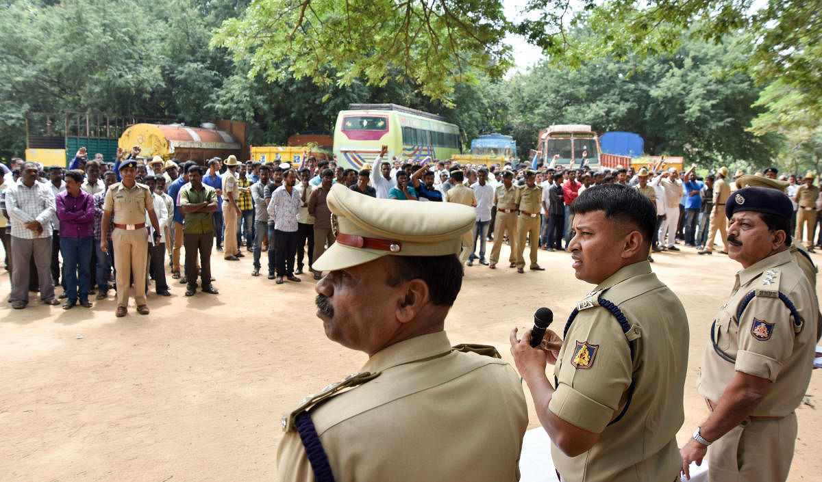 Ahead of Tipu Sultan jayanti, Deputy Commissioner of Police (DCP) N?Vishnuvardhana warns rowdysheeters not to involve in anti-social activities, at rowdysheeters parade at City Armed Reserve (CAR) grounds, in Mysuru, on Friday. - PHOTO / SAVITHA B R