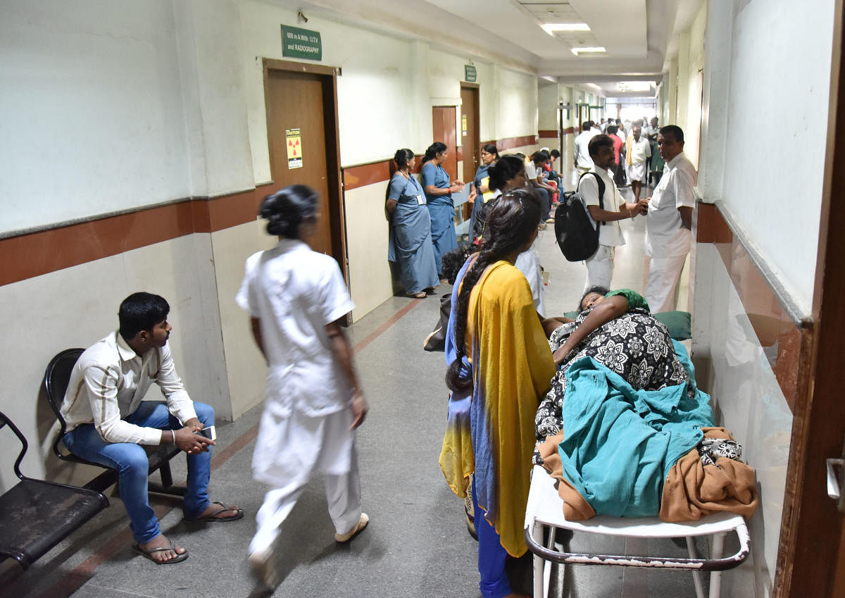 The patient waiting at the corridor of KIMS hospital during all private hospitals doctors are went to one day strike against Private Medical Establishments (Amendment) Bill by Karnataka government in Bengaluru on Friday. Photo by Janardhan B K