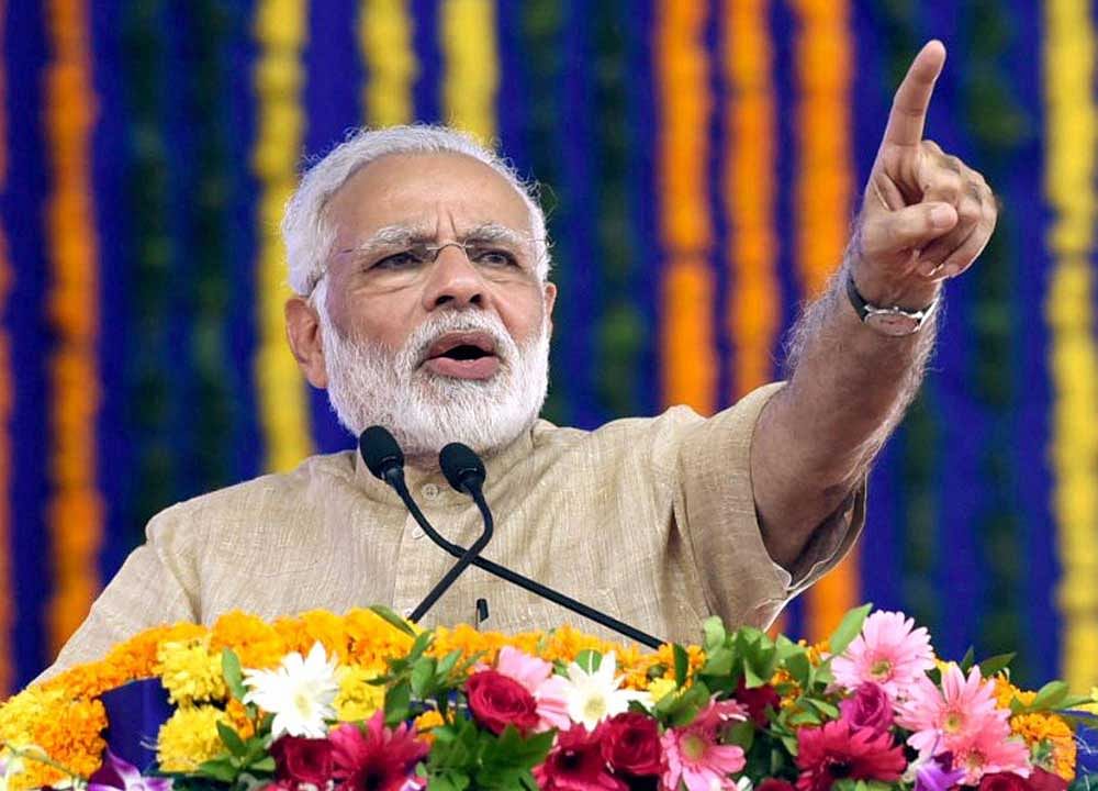 Prime Minister Narendra Modi said the ease of doing business ranking improved because the government initiated reforms to end difficulties in the lives of people. PTI File Photo