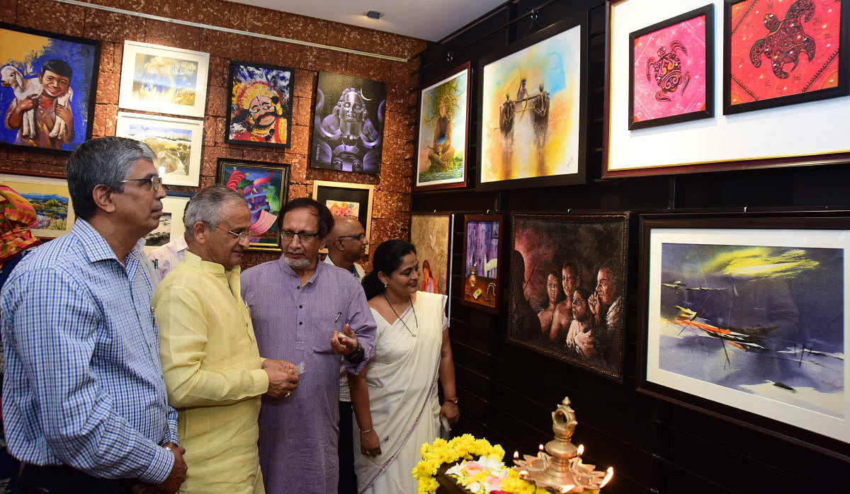MLC and Karnataka Legislative Council Chief Whip Capt Ganesh Karnik inaugurates exhibition of recent works and an interactive art programme as a part of Silver jubilee celebrations at S Cube Art Gallery, Gurji junction, Mannagudda, in Mangaluru on Saturday. Bants Mathr Sangha Women's Wing President and Asare Charitable Trust Chairpersons Dr Asha Jyothi Rai, Art Historian Nemiraj Shetty and others seen.