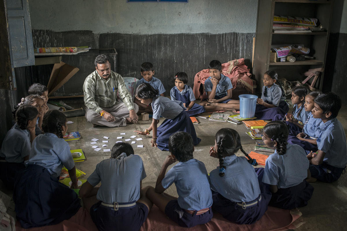 B Yadiah teaching at the Government school in Medipalli, Andhra Pradesh. Credit: UNESCO