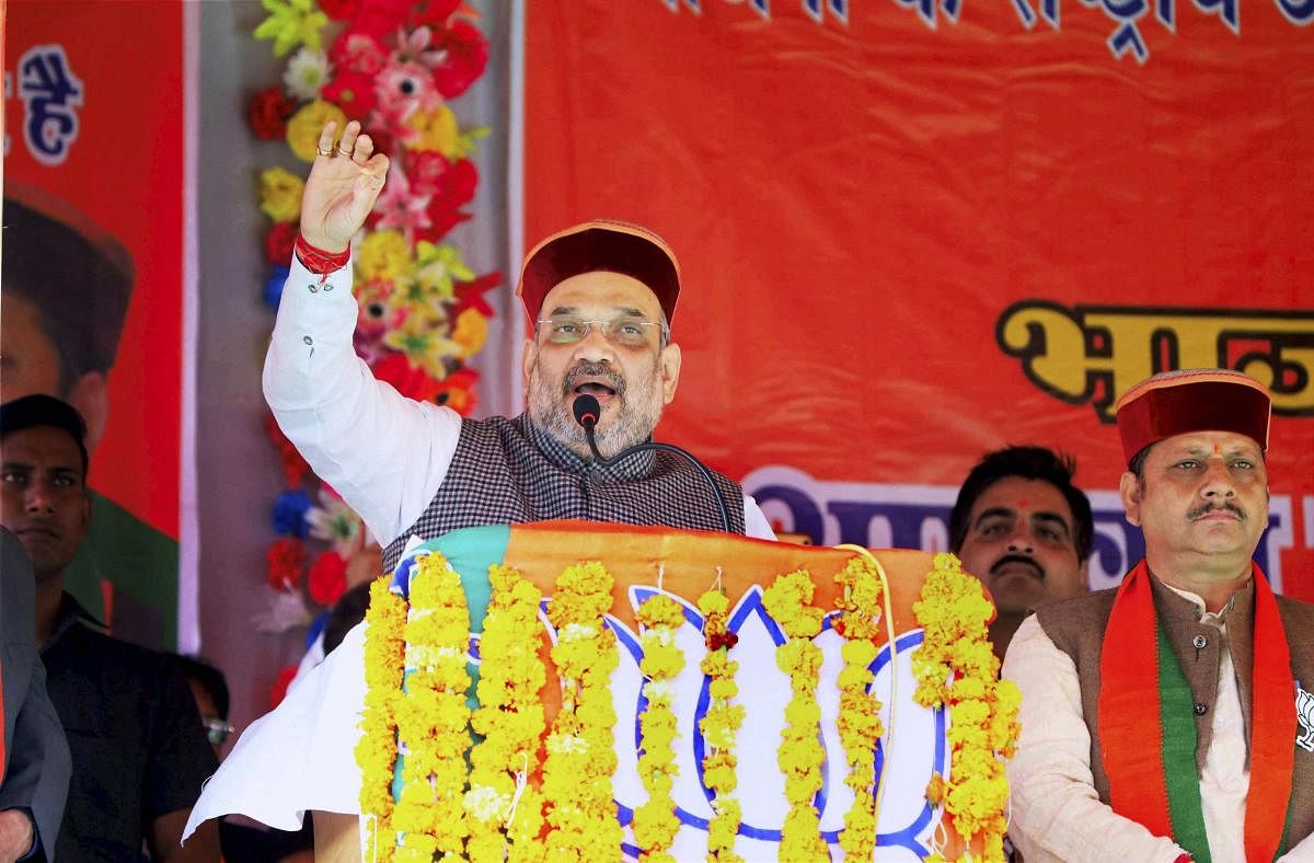 BJP National President Amit Shah addressing a public meeting at Banikhet in Chamba district of Himachal Pradesh on Monday.
