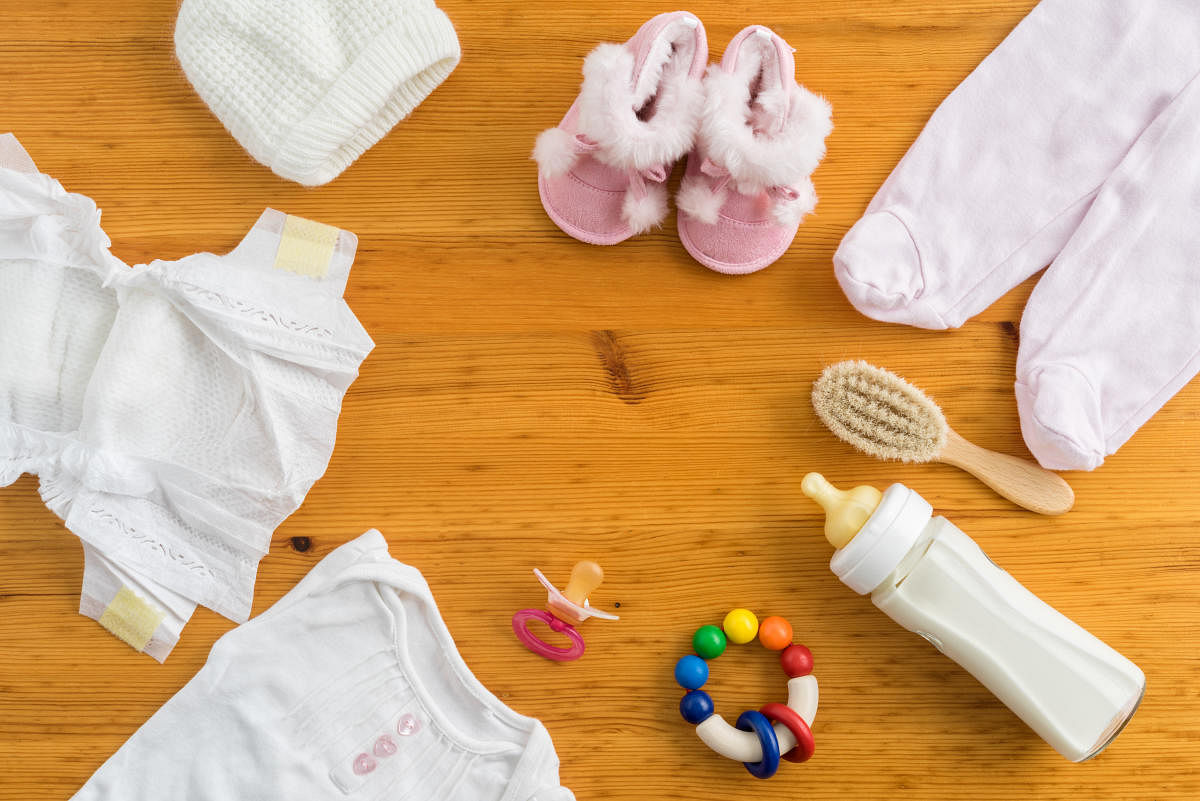 Collection of items for babies shot from above. Ideal website hero or header image