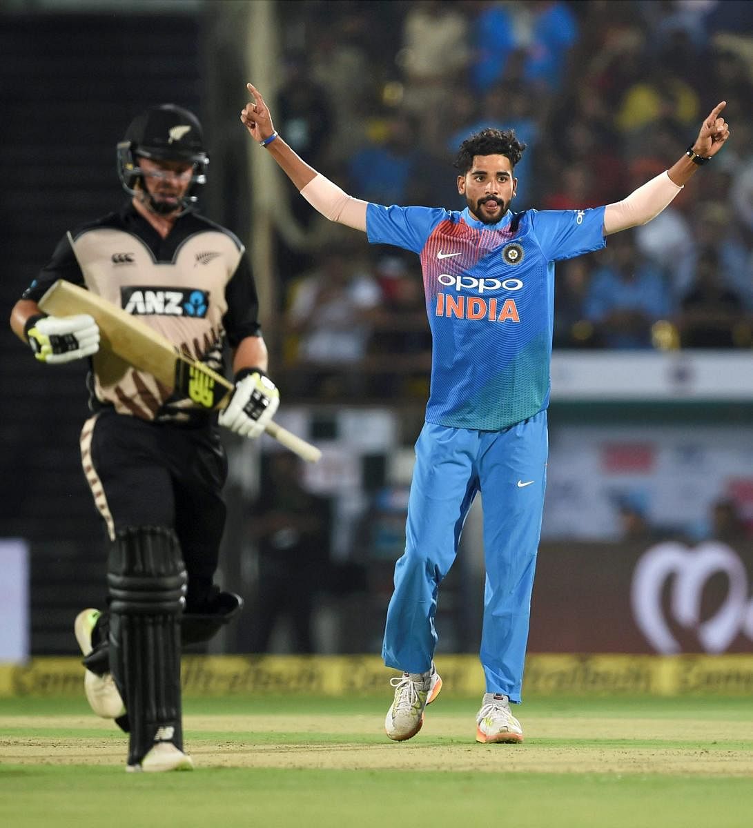 Indian cricketer Mohammed Siraj celebrates the wicket of New Zealand batsman Kane Williamson during the second T20 match in Rajkot on Saturday. PTI Photo